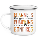 Load image into Gallery viewer, Picture of 12 ounce white enamel camp mug with graphic Flannels, hayrides, pumpkins, sweaters, bonfires. Each letter in muted  fall colors
