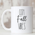 Load image into Gallery viewer, Picture of 11oz. All white Coffee mug with Cozy Fall Vibes in black letters
