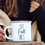 Load image into Gallery viewer, Picture of 11oz. Enamel White Coffee mug with Cozy Fall Vibes in black letters
