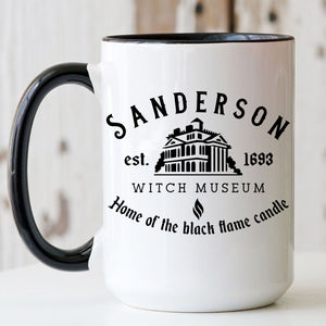 Picture of our 15oz Black Handle Coffee Mug with Graphic of Sanderson Witch Museum on front of mug.