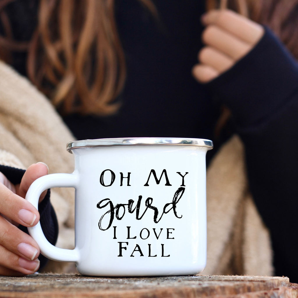 Picture of 11 oz White Enamel Camp Coffee Mug with Silver Rim.  Graphic of Oh My Gourd I Love Fall in Black colored font.