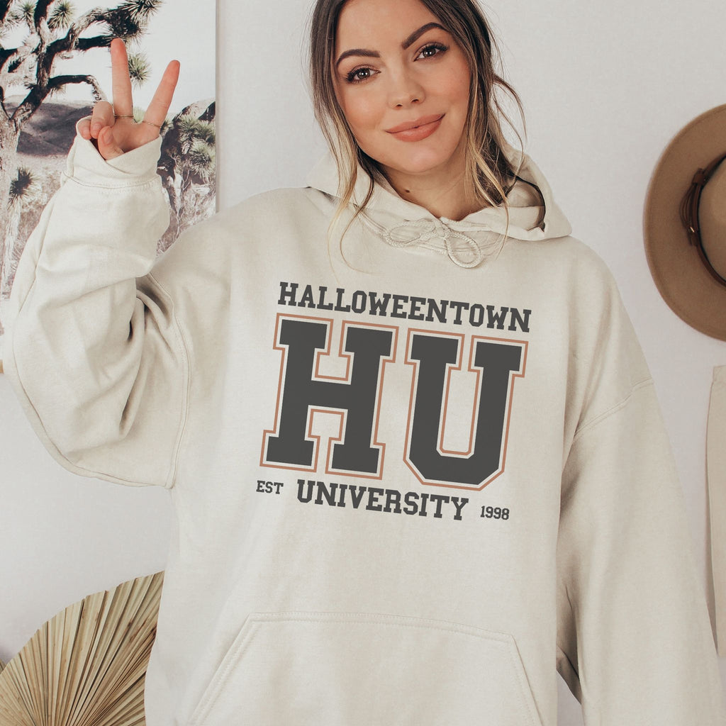 Picture of young woman in our Halloweentown - HU - University Pullover hoodie. Shown in Soft Cream