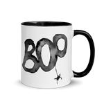 Load image into Gallery viewer, Picture of 11oz Black Handle Coffee Mug with Boo graphic for Halloween. A black Spider hangs from the &quot;o&quot;  Edit alt text
