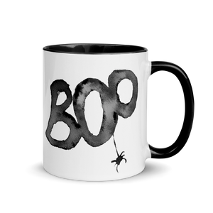 Picture of 11oz Black Handle Coffee Mug with Boo graphic for Halloween. A black Spider hangs from the "o"  Edit alt text