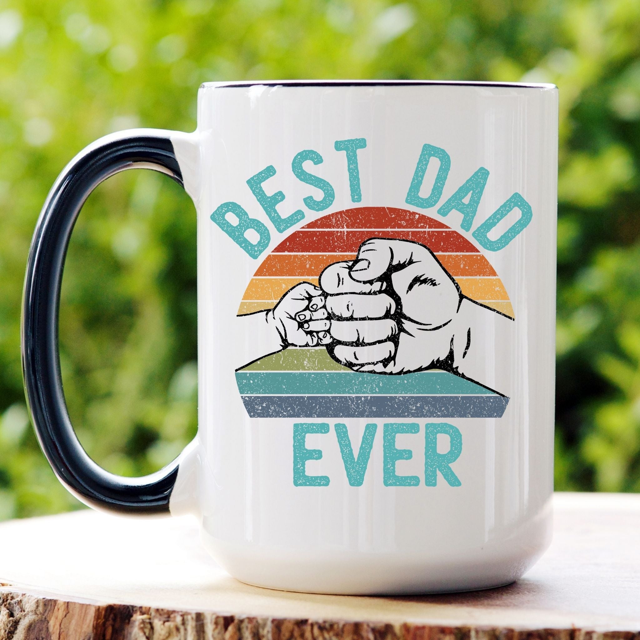 Picture of our 15oz Black Handle Coffee Mug with Graphic of Retro and Distressed Best Dad Ever front of mug.