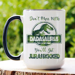 Load image into Gallery viewer, Picture of our 15oz Black Handle Coffee Mug with Graphic of Don&#39;t Mess With Dadasaurus on front of mug. Great for Jurassic Park fans!
