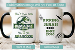 Load image into Gallery viewer, Picture of our 15 oz. Black handle mugs, front and back showing graphic on both sides. Front and Back Image is Don&#39;t Mess With Dadasaurus, You&#39;ll Get Jurrasskicked on the back, Kicking Jurass Since custom year. Great for Jurassic Park fans! Sublimation Image will not Peel or Fade.
