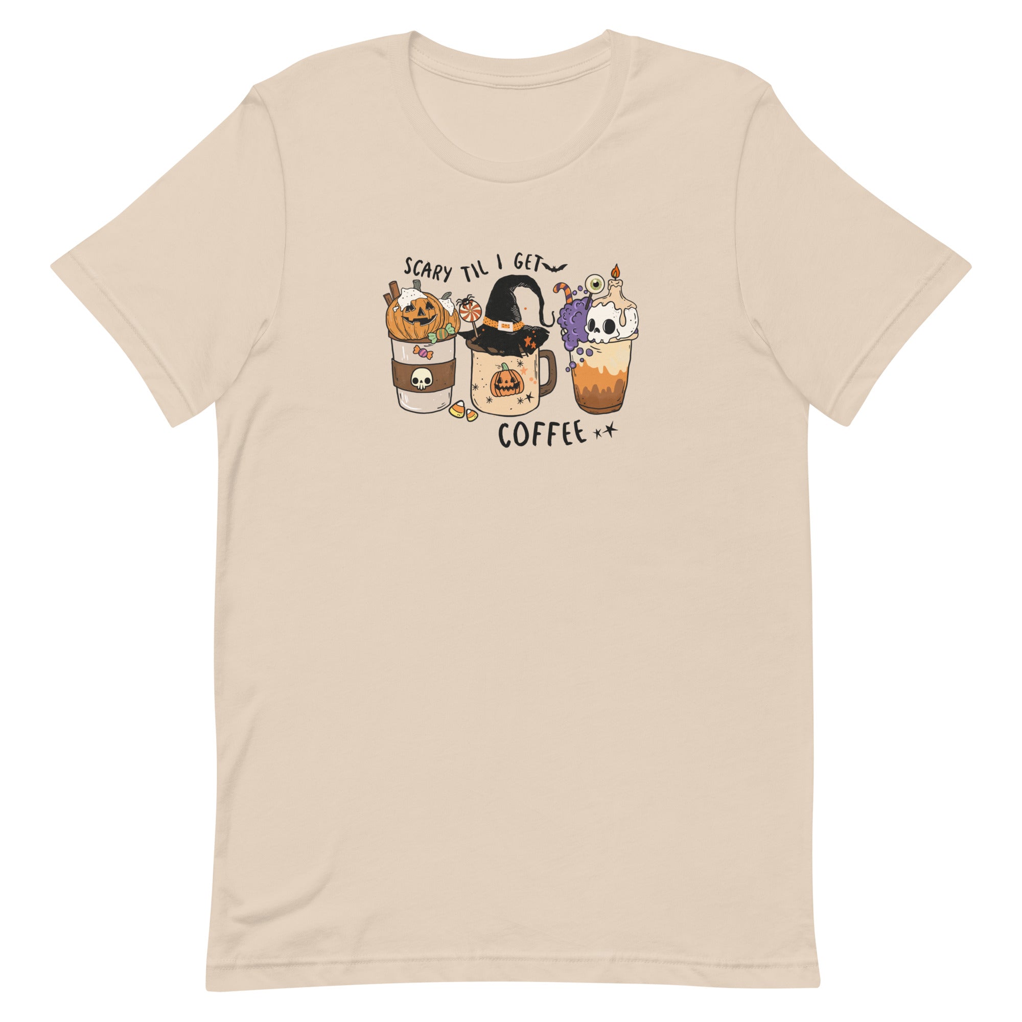 Soft cream women's t-shirt for halloween with graphic of three coffee drinks, one with a pumpkin, the center with a witches hat and the last with a skull candle.